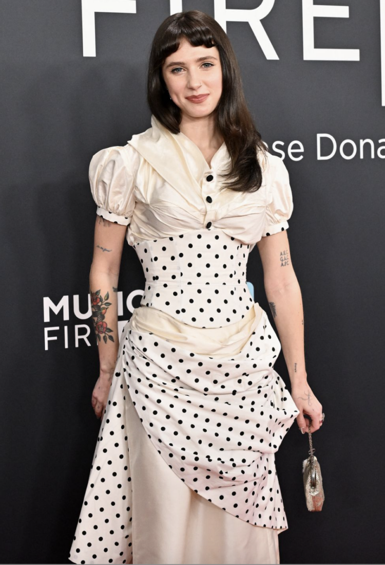 musical artist Clairo at the 2025 GRAMMY awards in a polka dot dress from Miss Claire Sullivan